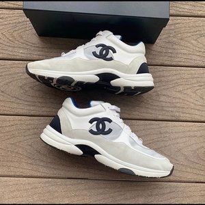 CHANEL RUNNERS

Size: 42 eu (9-10us)